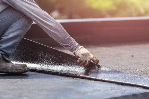 Professional Waterproofing technician working in Shawnee, KS